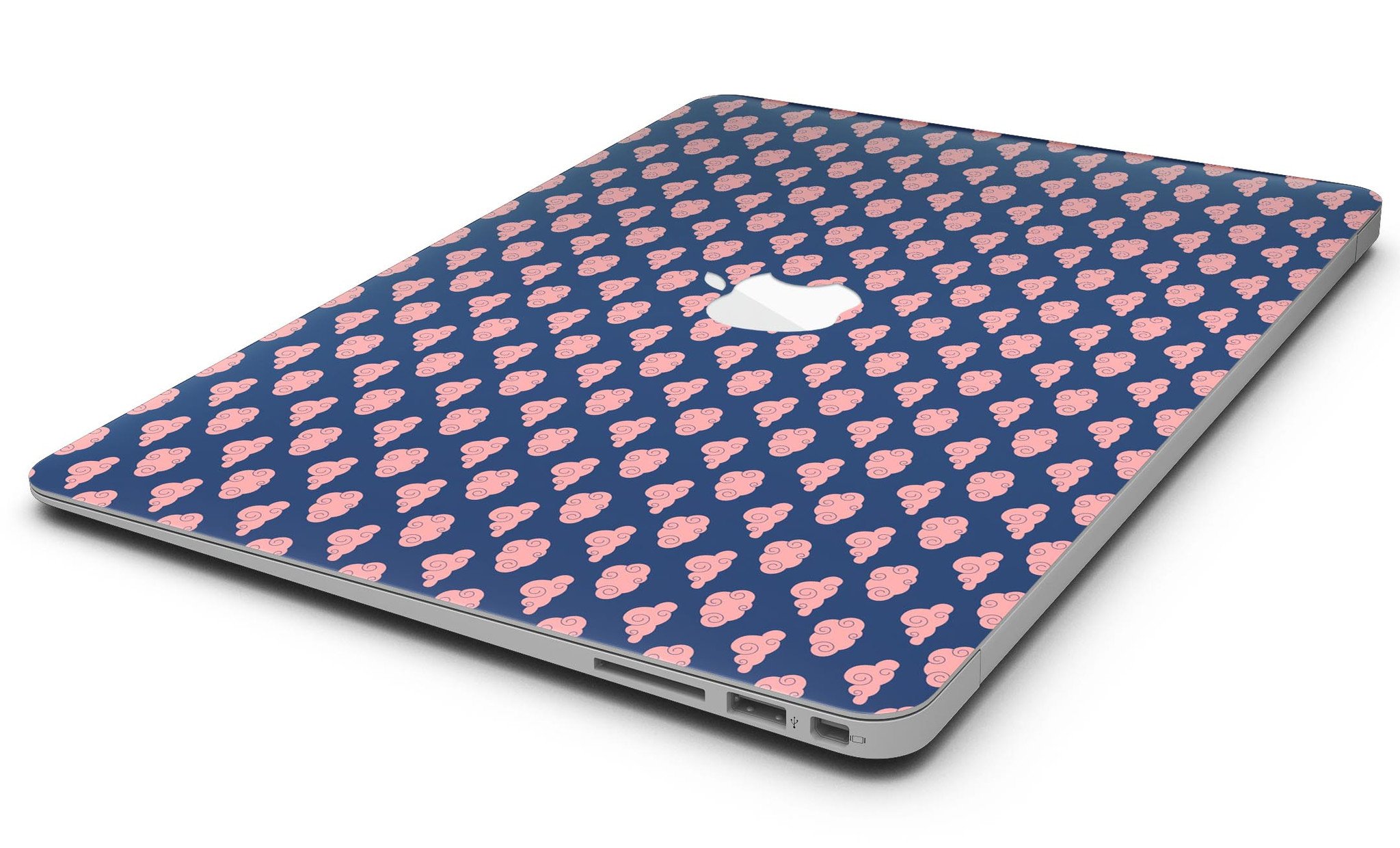 Coral Micro Cloud Swirls skin kit for MacBook Air, showcasing vibrant coral patterns over a navy background.