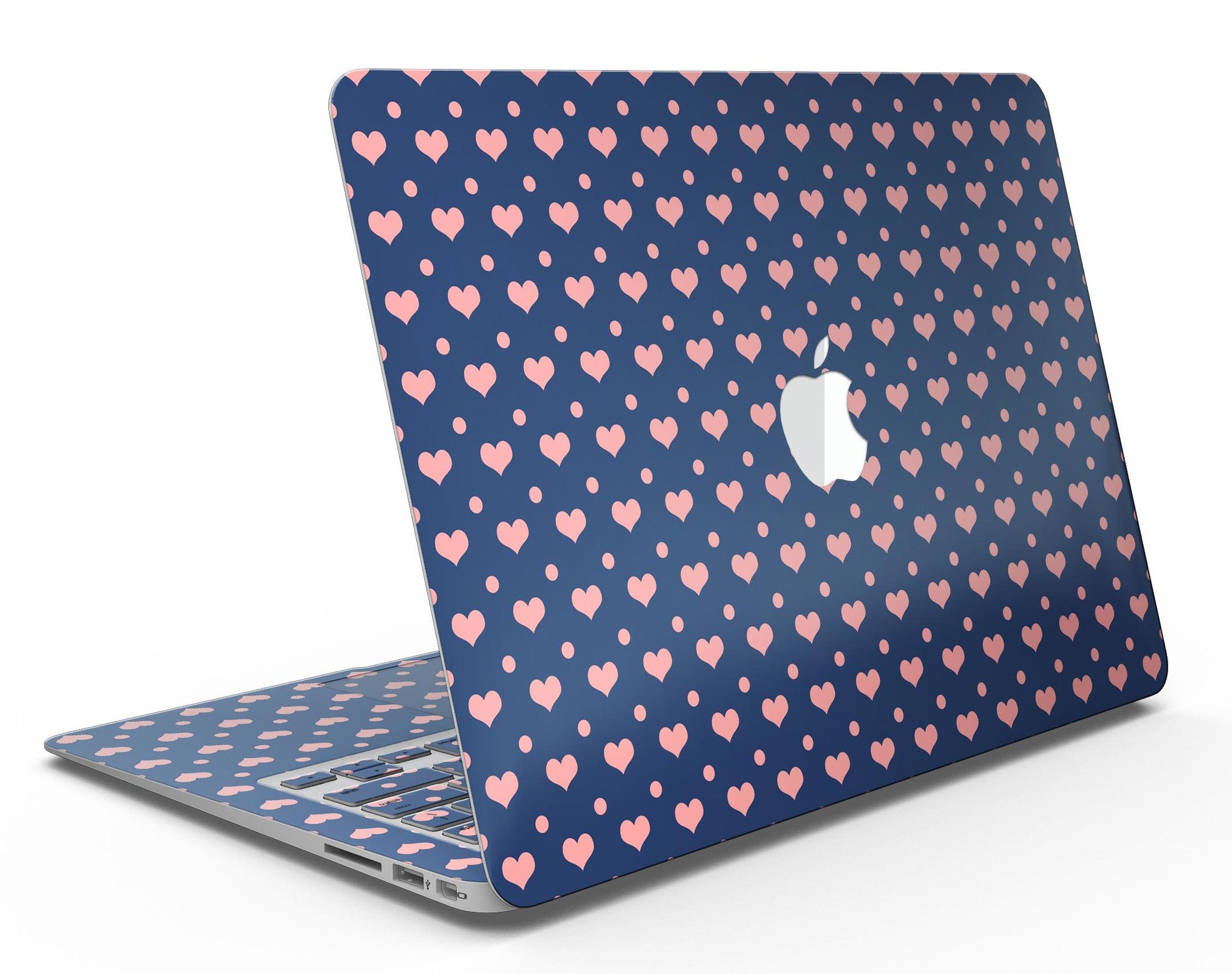 Coral Micro Hearts and Dots Skin Kit for MacBook Air, featuring a navy background with vibrant coral designs.