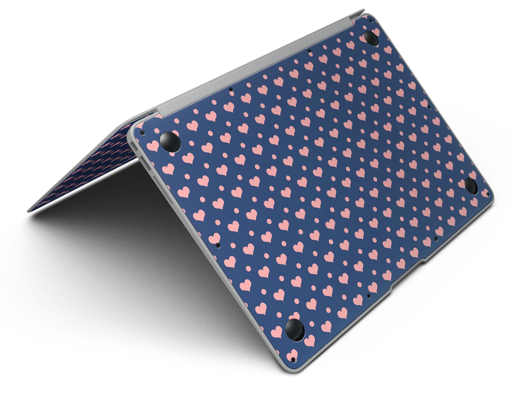 Coral Micro Hearts and Dots Skin Kit for MacBook Air, featuring a navy background with vibrant coral designs.