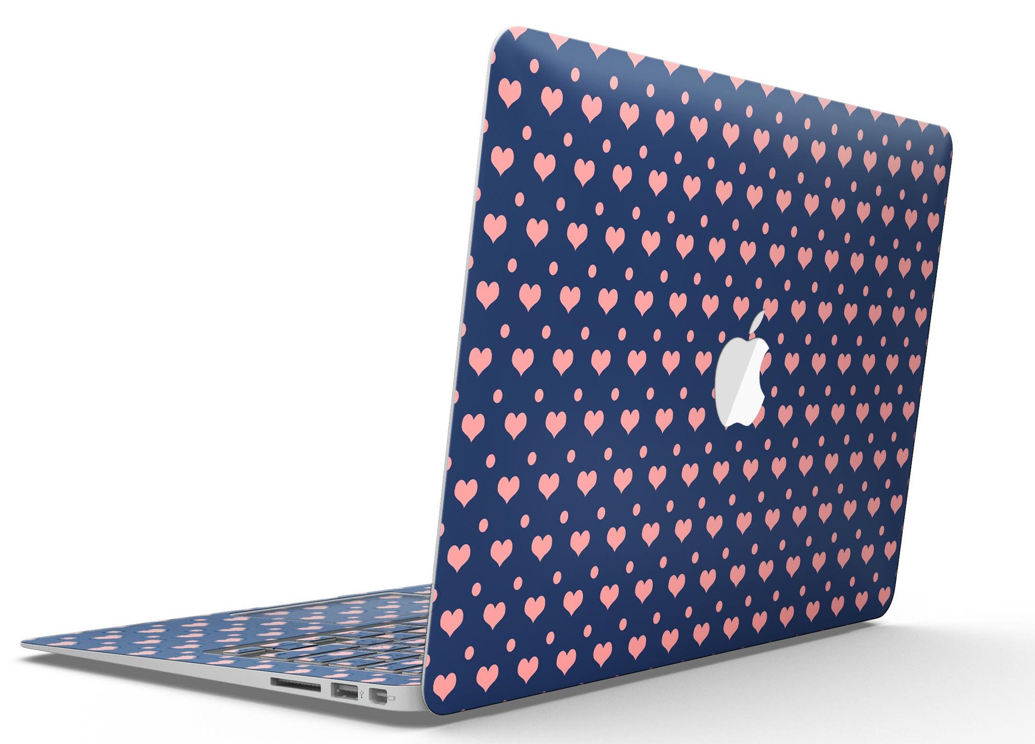 Coral Micro Hearts and Dots Skin Kit for MacBook Air, featuring a navy background with vibrant coral designs.