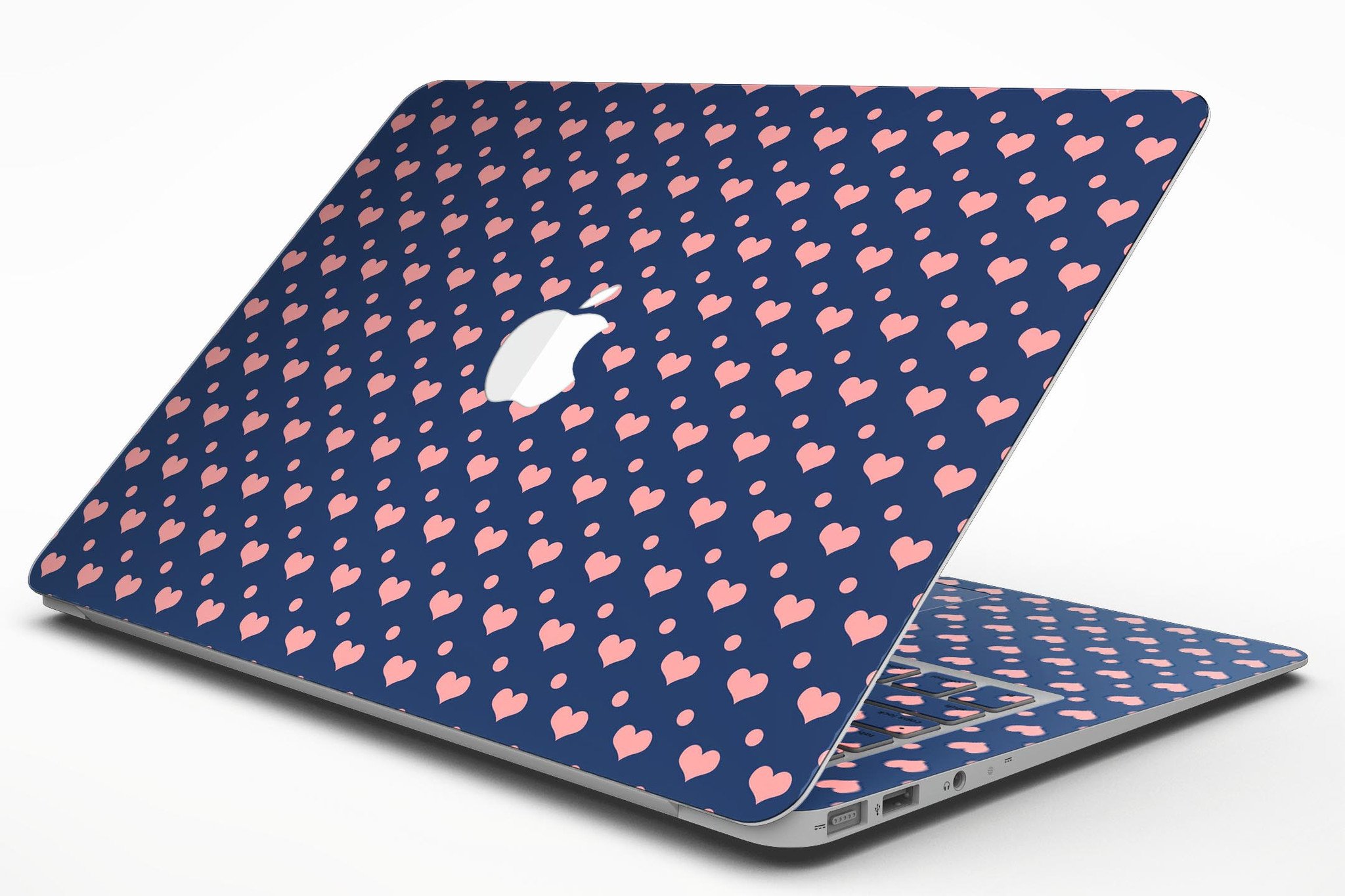 Coral Micro Hearts and Dots Skin Kit for MacBook Air, featuring a navy background with vibrant coral designs.