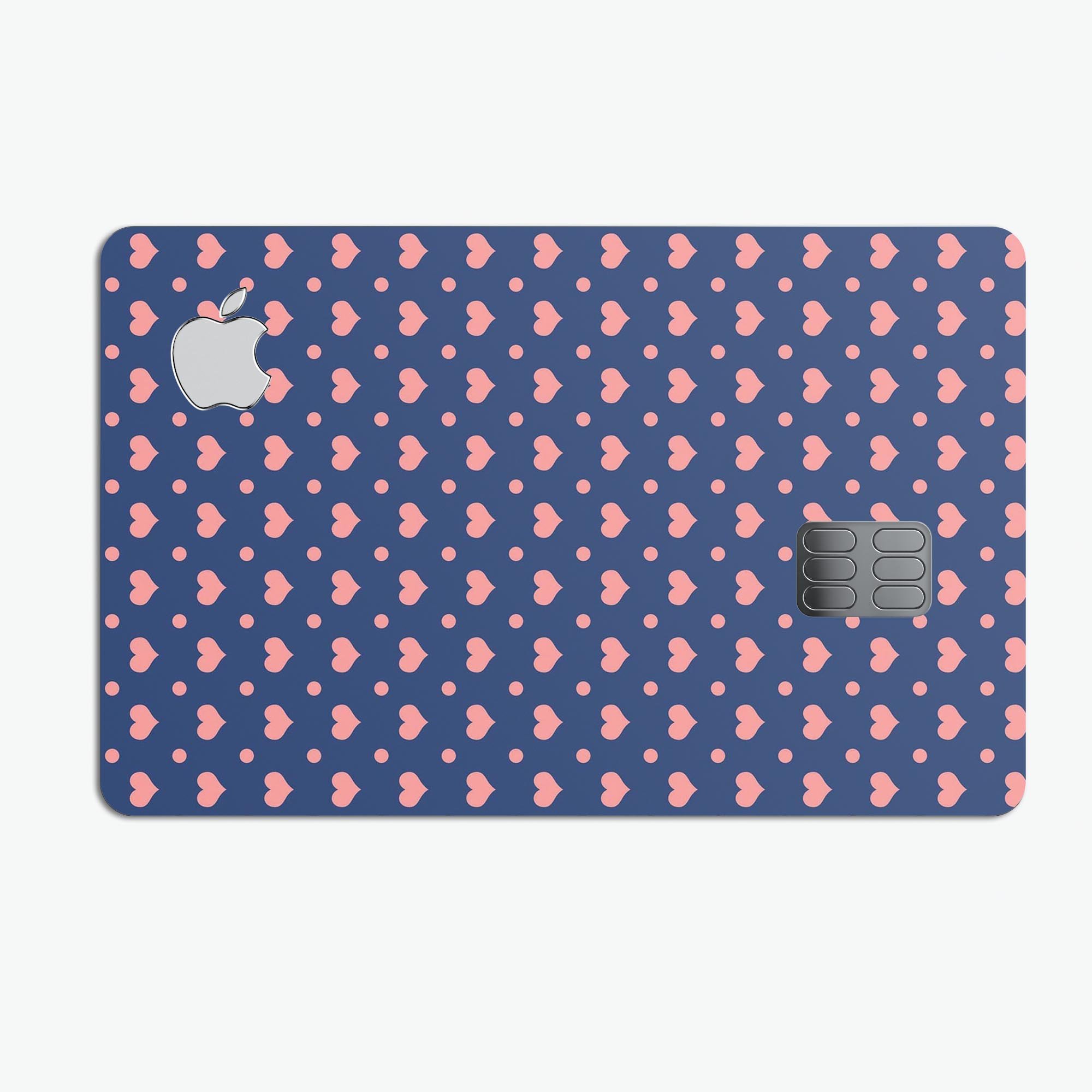 Coral Micro Hearts and Dots decal on a navy background, designed for Apple Card protection.