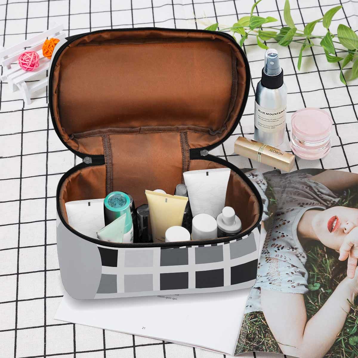 Stylish cosmetic bag with multiple compartments, made of durable water-resistant material, perfect for organizing beauty essentials.