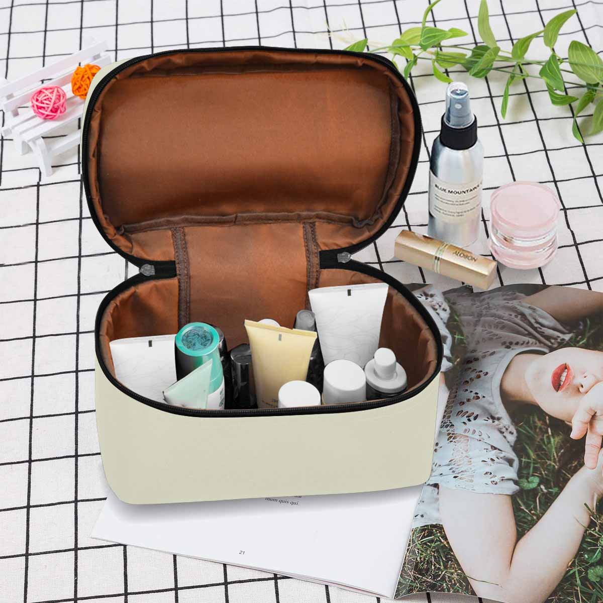 Beige cosmetic bag with multiple compartments and secure zipper closure, perfect for organizing beauty essentials.