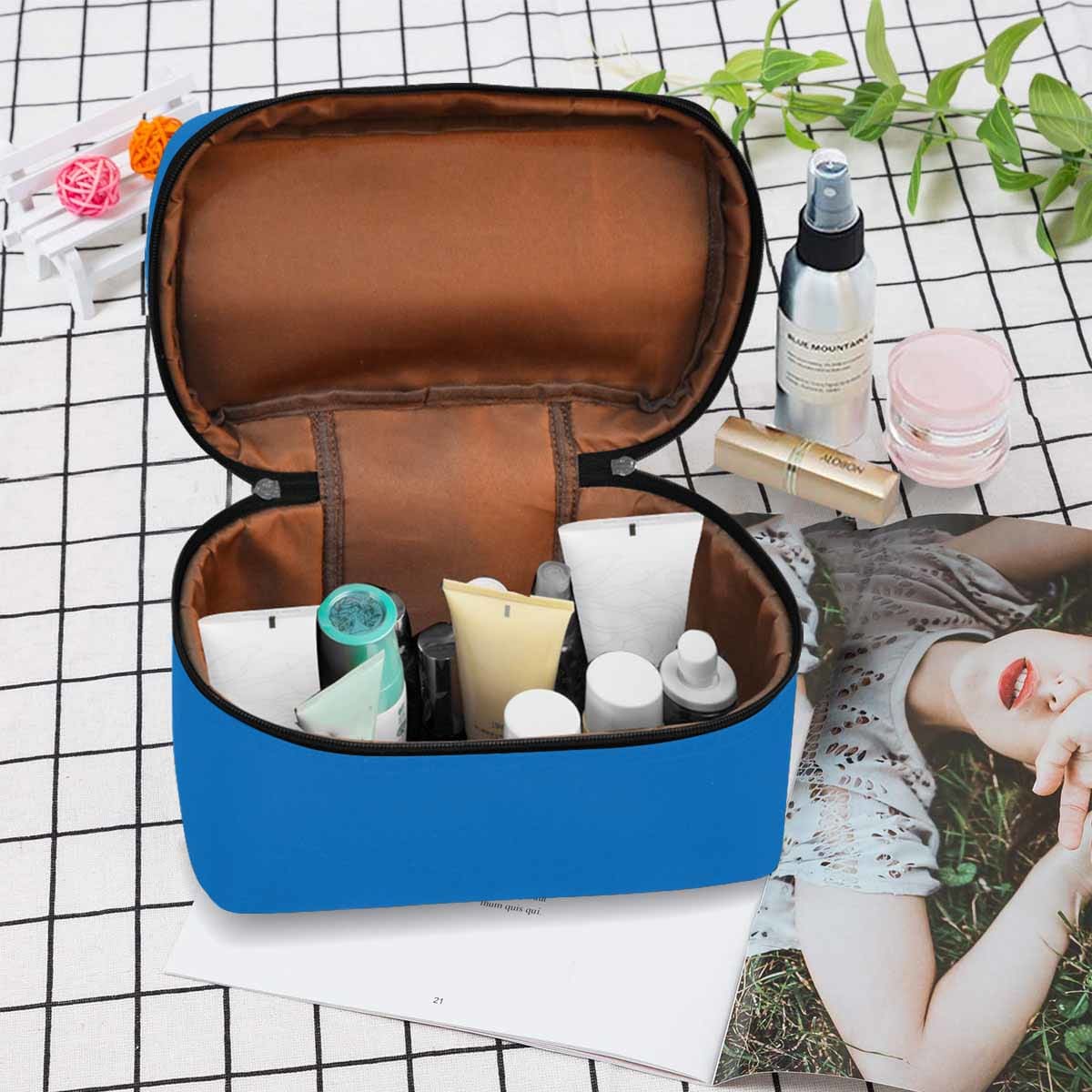 Blue Grotto Cosmetic Bag showcasing its stylish design and spacious compartments for organizing beauty essentials.