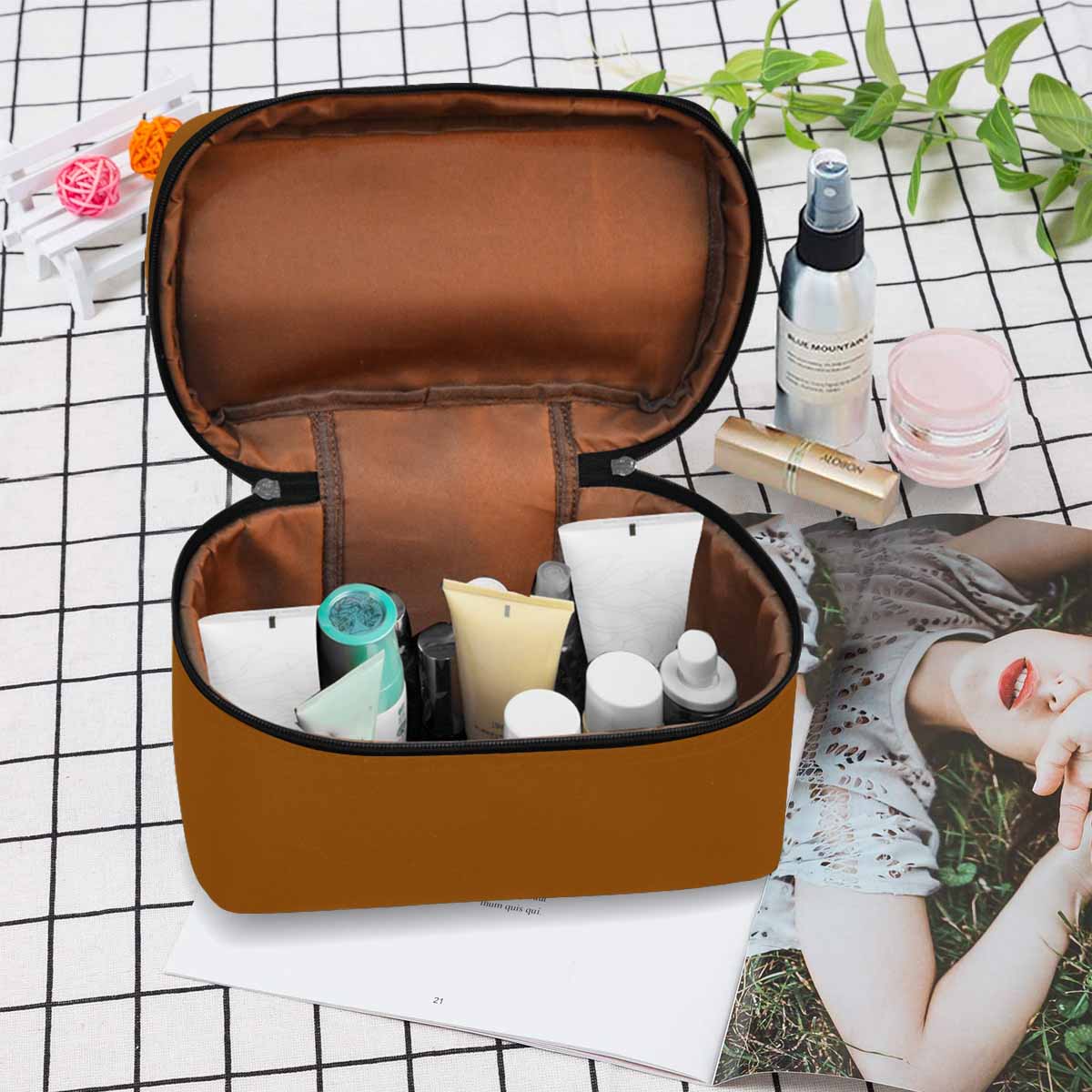 Stylish brown cosmetic bag with multiple compartments and zipper closure, perfect for organizing beauty essentials.