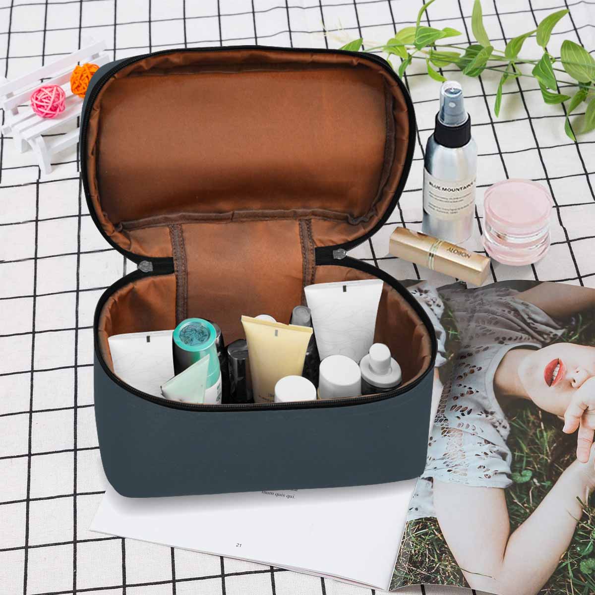 Charcoal Black Cosmetic Bag with multiple compartments and secure zipper closure, ideal for organizing beauty essentials.