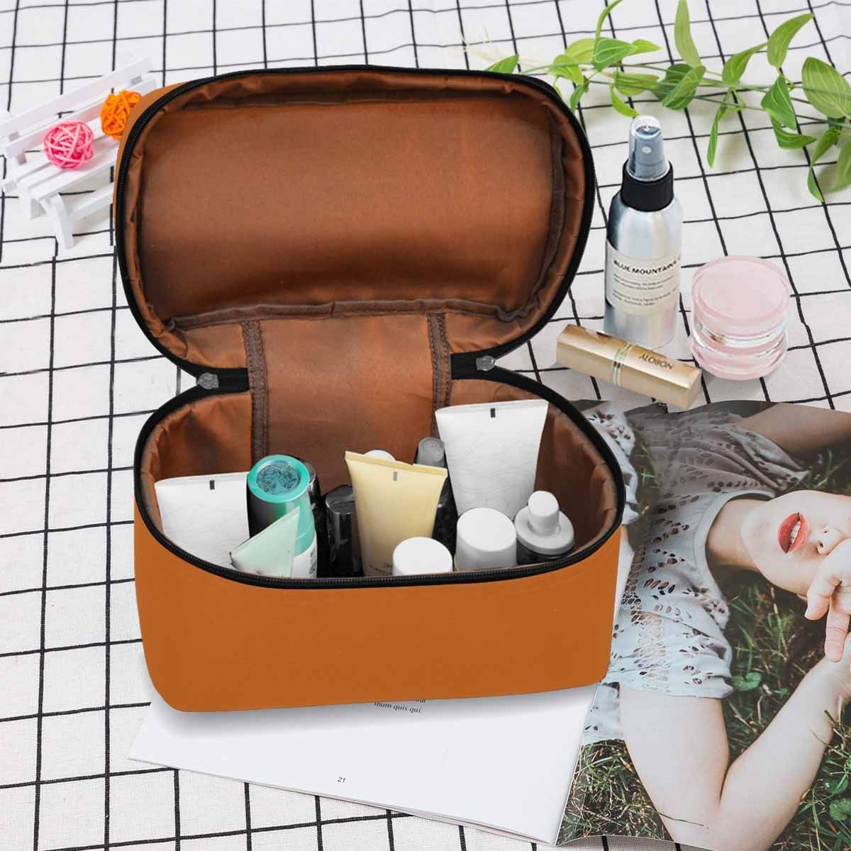 Cinnamon Brown Cosmetic Bag with multiple compartments and zipper closure, perfect for organizing beauty essentials.