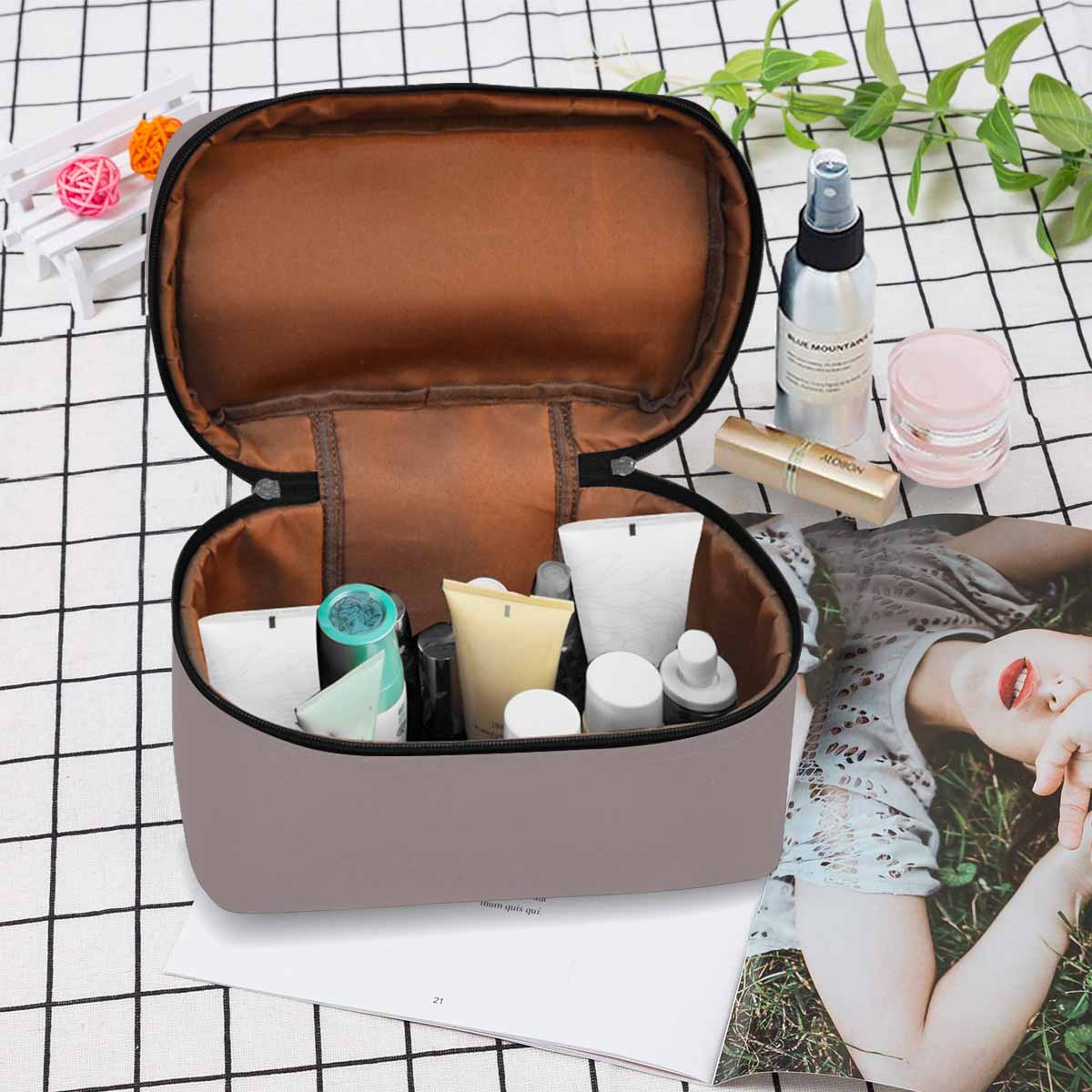 Stylish Coffee Brown Cosmetic Bag with multiple compartments and secure zipper closure, perfect for travel and organization.