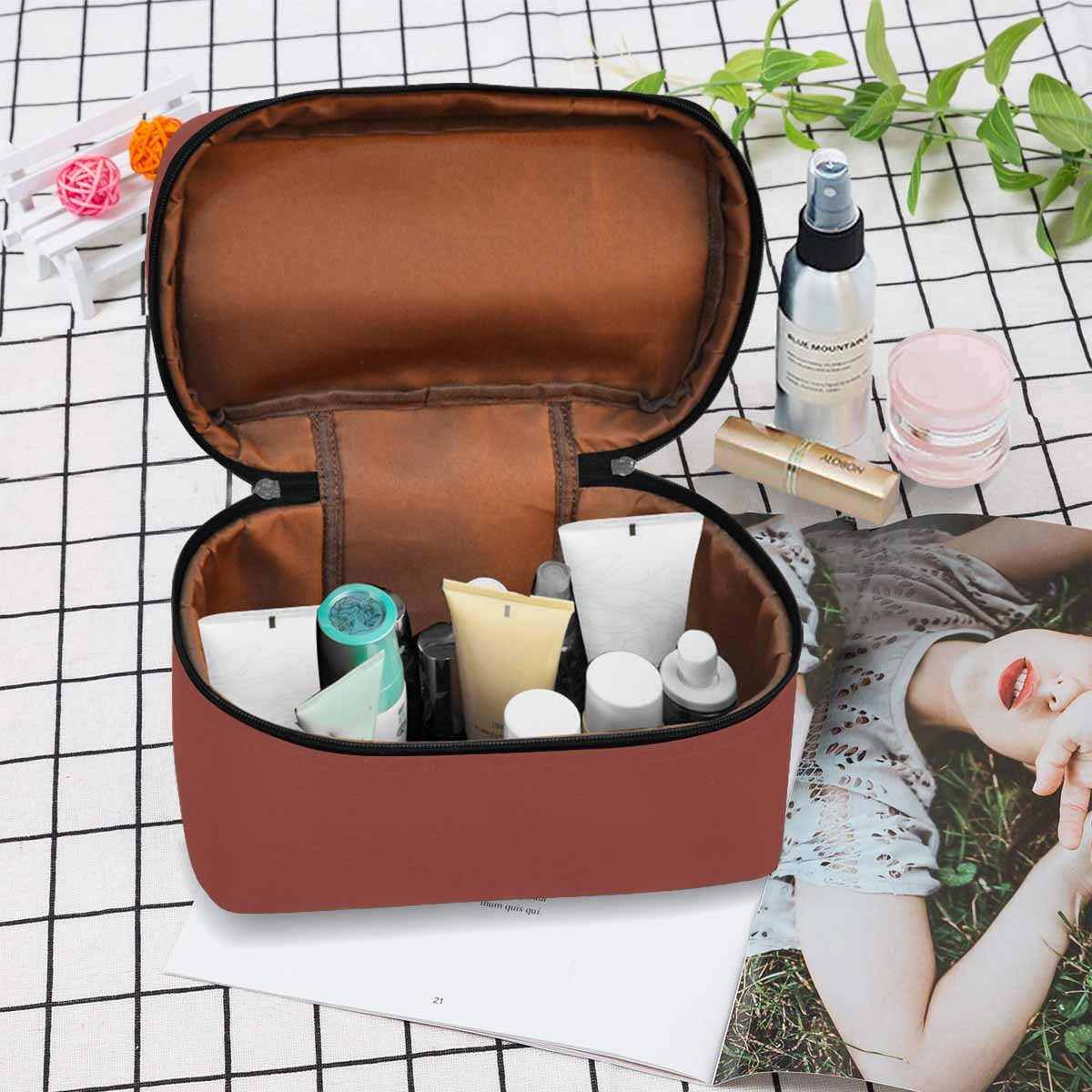 Cognac Red Cosmetic Bag with multiple compartments and zipper closure, perfect for organizing beauty essentials.