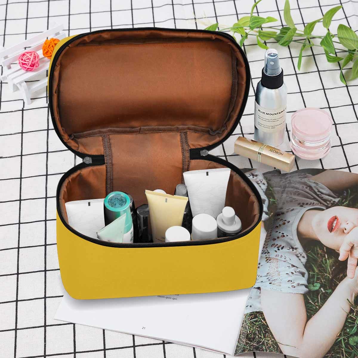 Freesia Yellow Cosmetic Bag showcasing its stylish design and spacious compartments for beauty essentials.