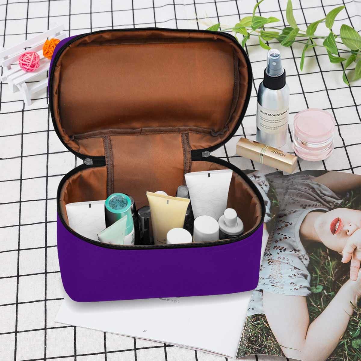 Indigo Purple Cosmetic Bag with multiple compartments and secure zipper closure, perfect for travel and organizing beauty essentials.