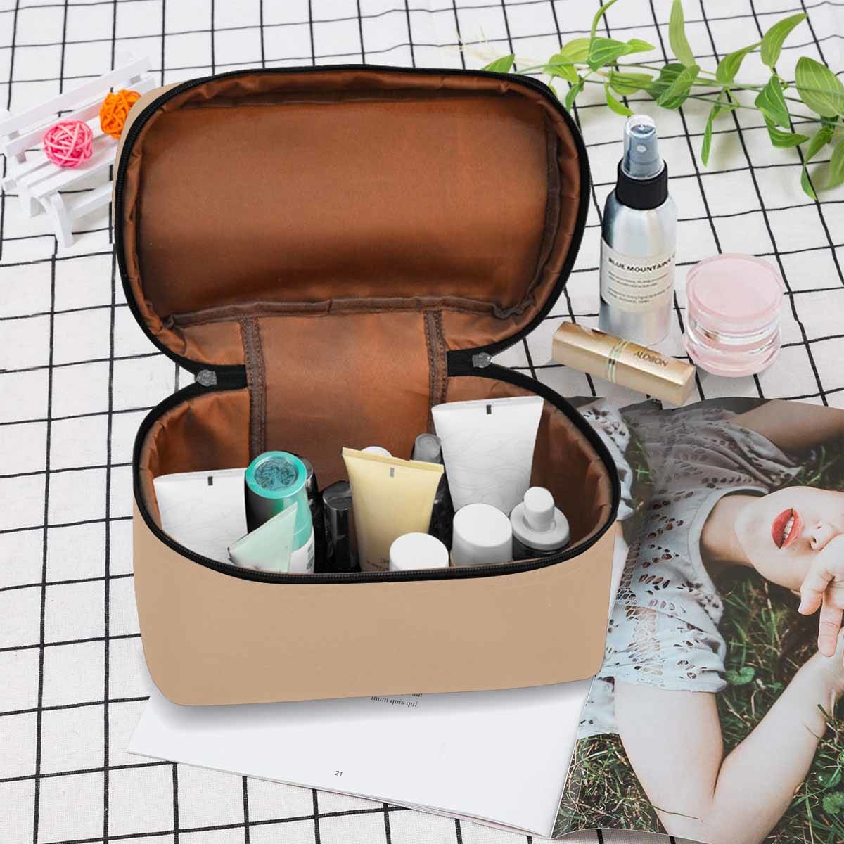 Stylish Nude Brown Cosmetic Bag with compartments, perfect for travel and organizing beauty essentials.