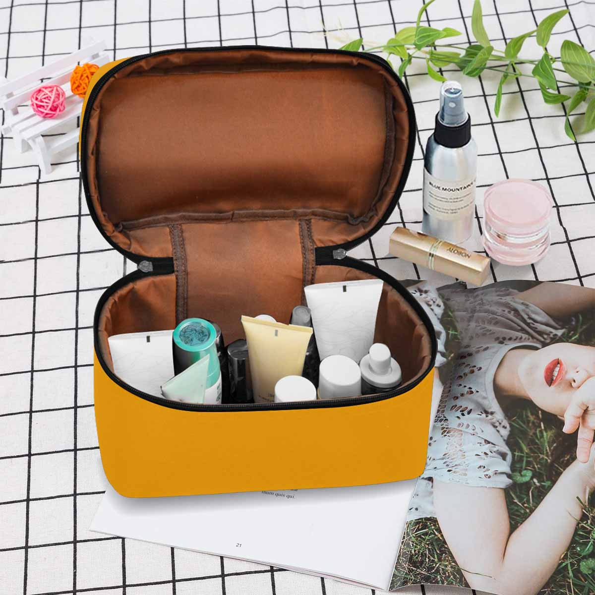 Stylish orange cosmetic bag with multiple compartments and secure zipper closure, perfect for organizing beauty essentials.