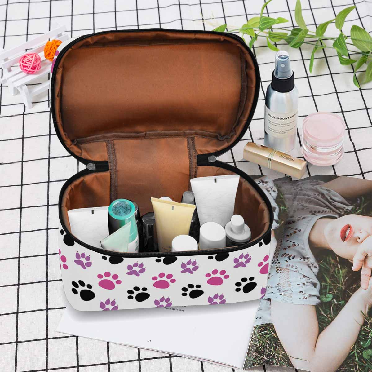 Stylish waterproof cosmetic bag in black and brown, featuring a zipper closure and spacious interior for travel and organization.