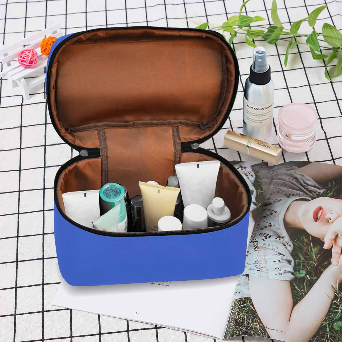 Royal Blue Cosmetic Bag with multiple compartments, stylish design, and secure zipper closure, perfect for travel and organization.