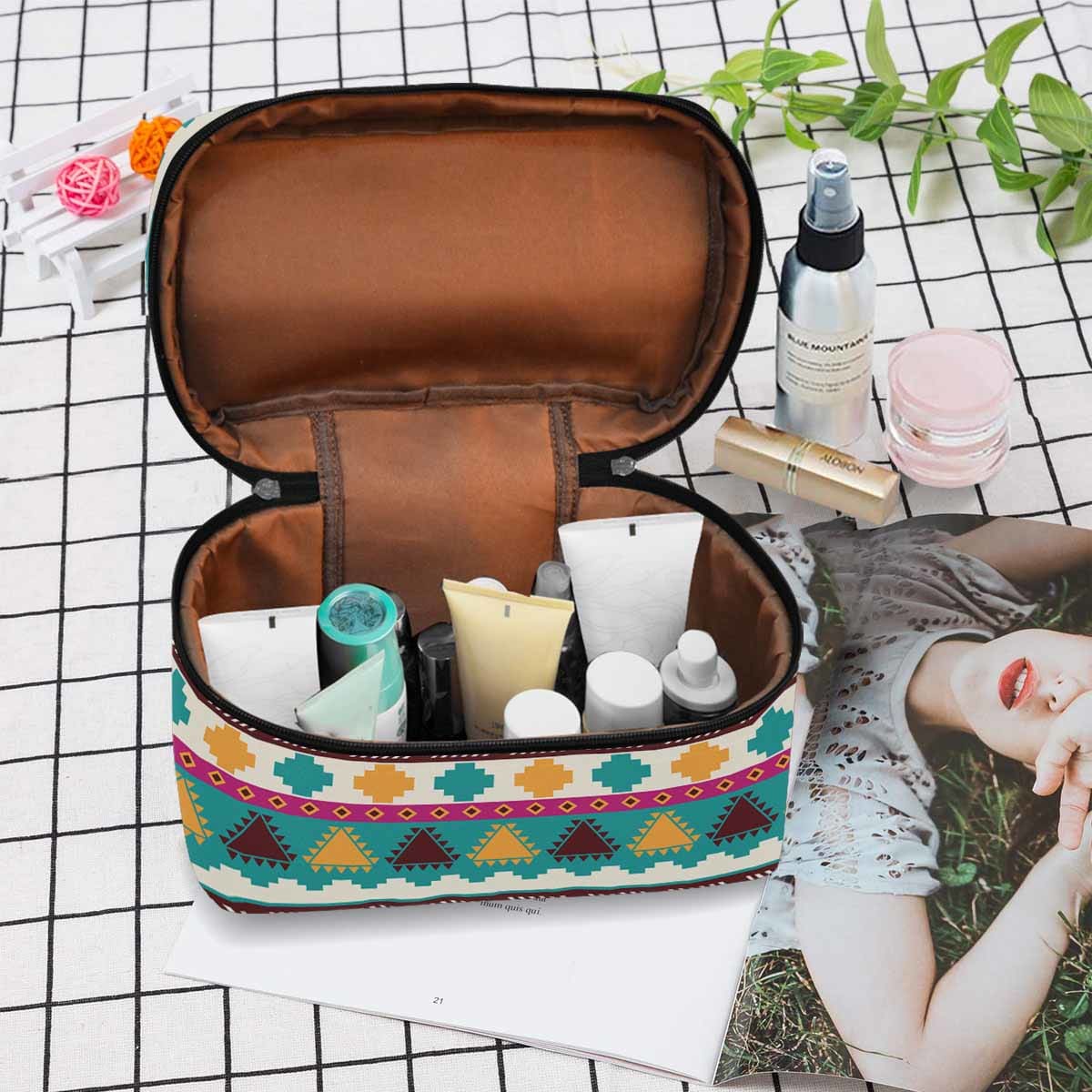 A stylish waterproof cosmetic bag in black and brown, featuring a zipper closure, ideal for travel and organization.