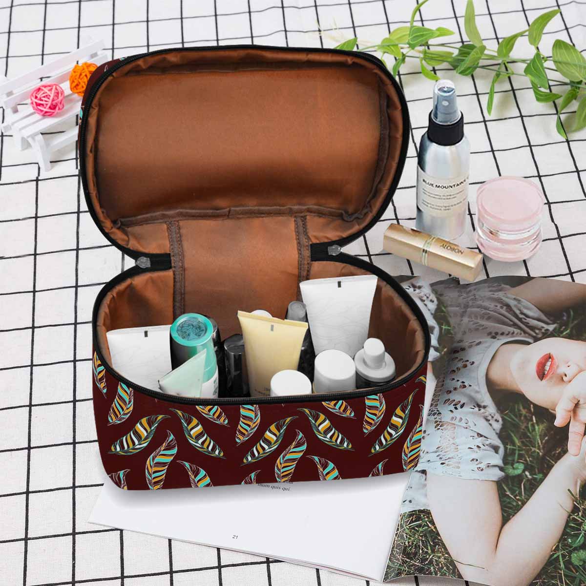 A stylish black and brown waterproof cosmetic bag with zipper closure, ideal for travel and organization of beauty essentials.