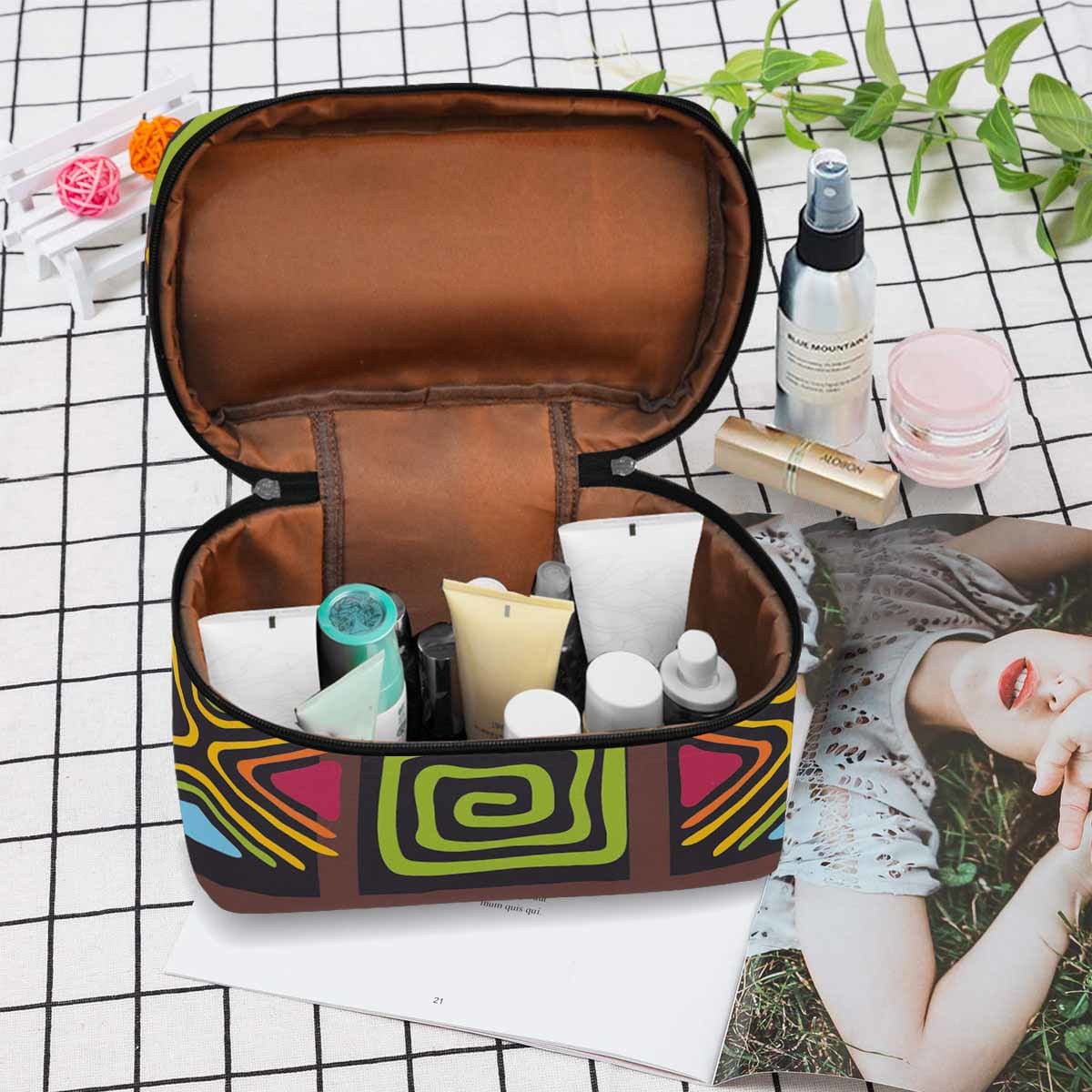 A stylish waterproof cosmetic bag in black and brown, featuring a zipper closure, ideal for travel and organization.