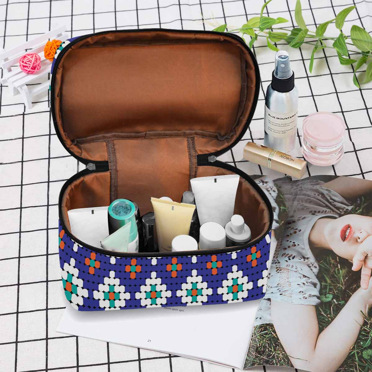 A stylish waterproof cosmetic bag in black and brown, featuring a zipper closure, perfect for travel and organization of beauty essentials.