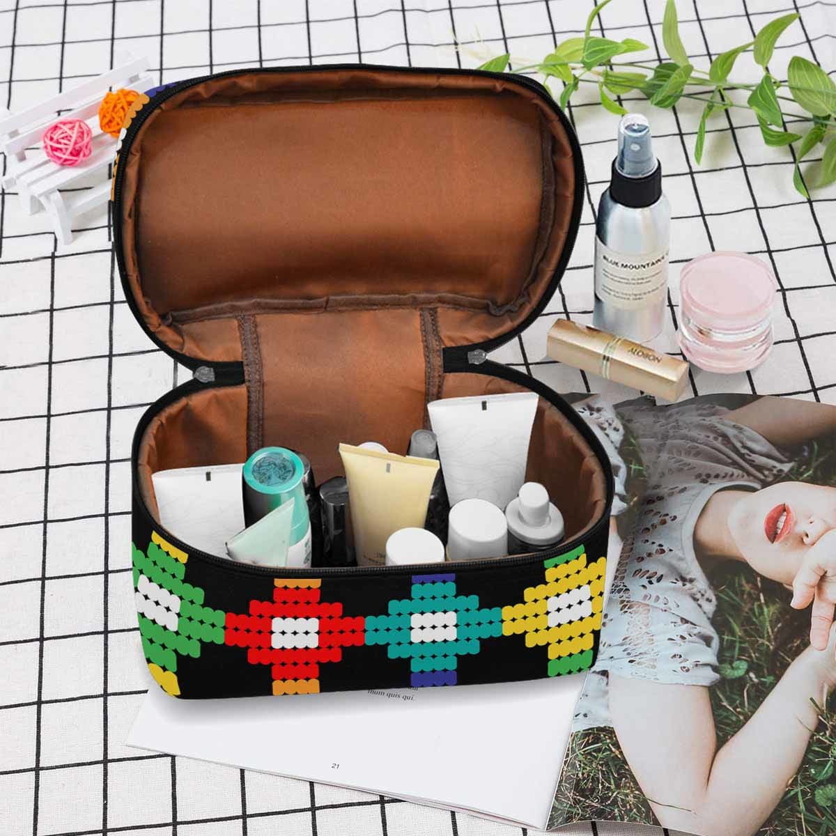 A stylish waterproof cosmetic bag in black and brown, featuring a zipper closure, ideal for travel and organization of beauty products.