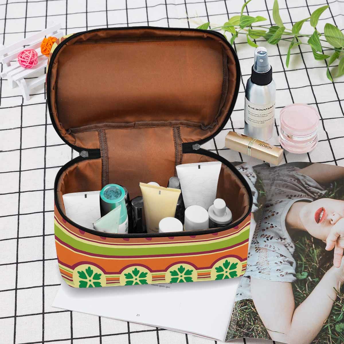 A stylish black and brown waterproof cosmetic bag with zipper closure, ideal for travel and organizing beauty essentials.