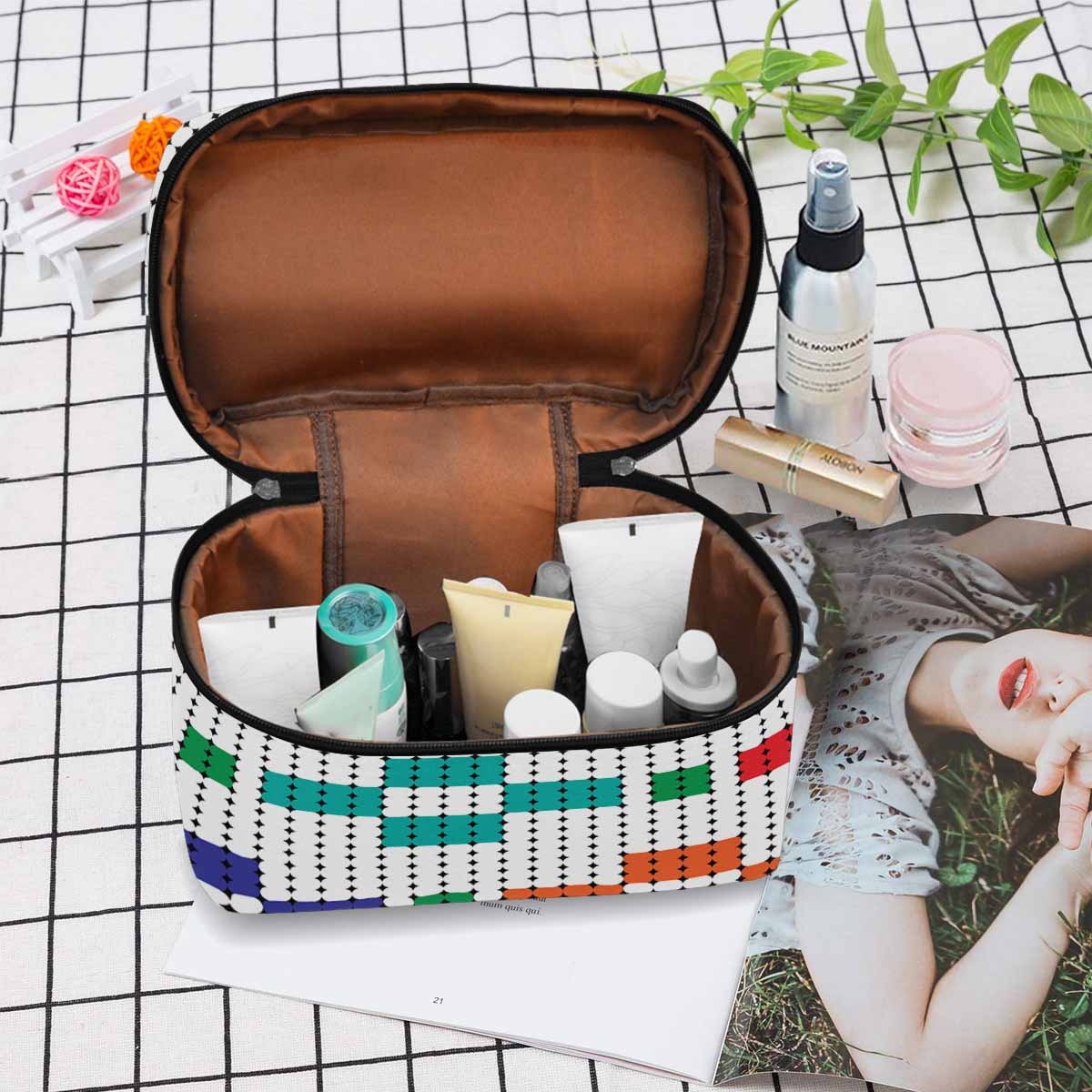 Stylish black and brown waterproof cosmetic bag with zipper closure, ideal for travel and organization.