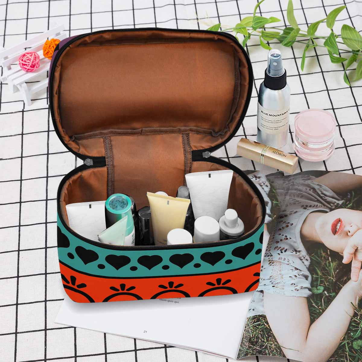 A stylish black and brown waterproof cosmetic bag with a zipper closure, ideal for travel and organization of beauty essentials.