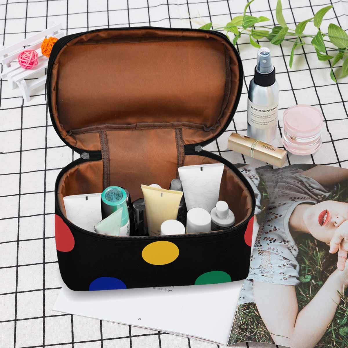 A stylish waterproof cosmetic bag in black and brown, featuring a zipper closure, ideal for travel and organization of beauty products.