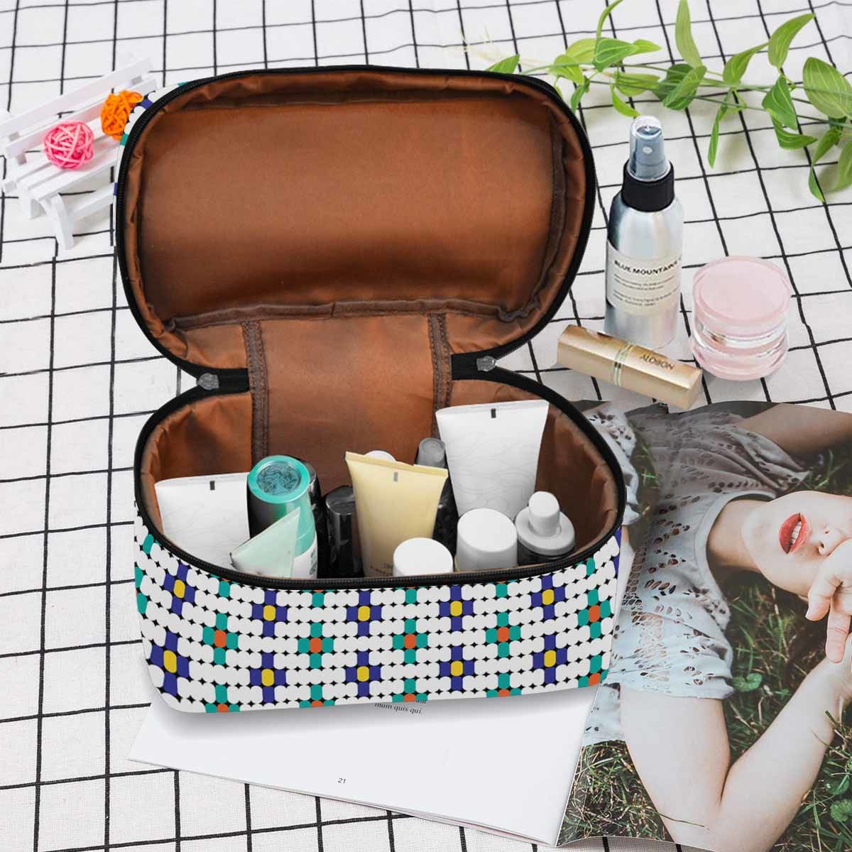 Stylish black and brown waterproof cosmetic bag with zipper closure, perfect for travel and organization.