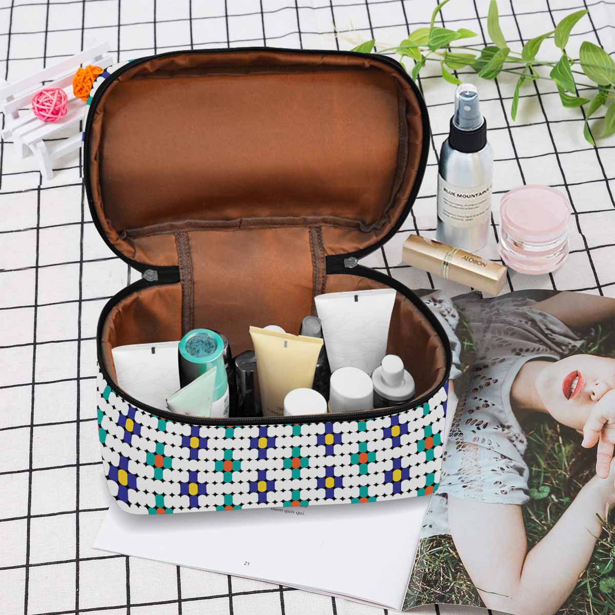 Stylish black and brown waterproof cosmetic bag with zipper closure, perfect for travel and organization.