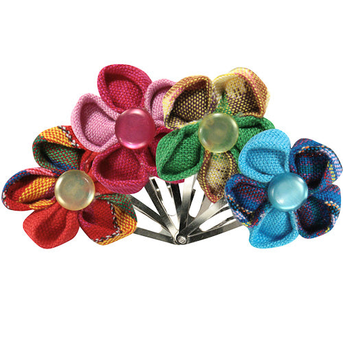 Colorful handmade Cotton Flower Hair Clip featuring vibrant Guatemalan fabrics, perfect for little girls.