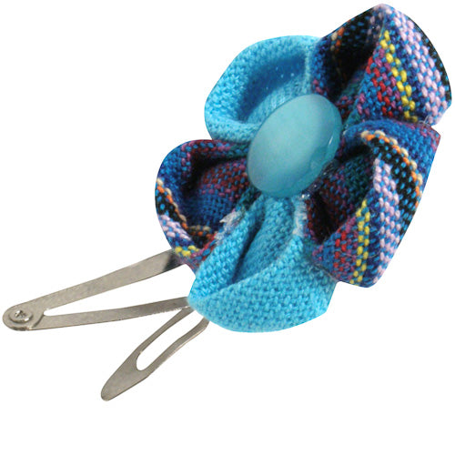 Colorful handmade Cotton Flower Hair Clip featuring vibrant Guatemalan fabrics, perfect for little girls.