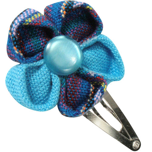 Colorful handmade Cotton Flower Hair Clip featuring vibrant Guatemalan fabrics, perfect for little girls.