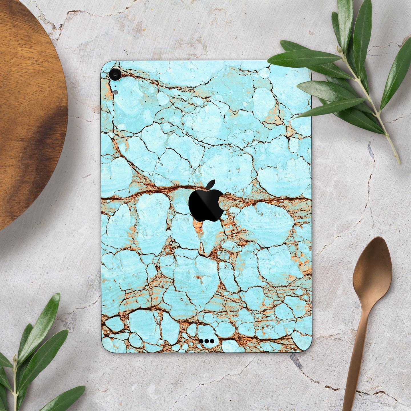 Cracked Teal Stone skin decal for Apple iPad Pro, showcasing its vibrant design and premium finish.