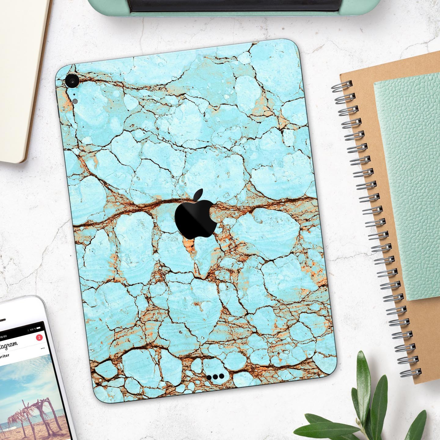 Cracked Teal Stone skin decal for Apple iPad Pro, showcasing its vibrant design and premium finish.