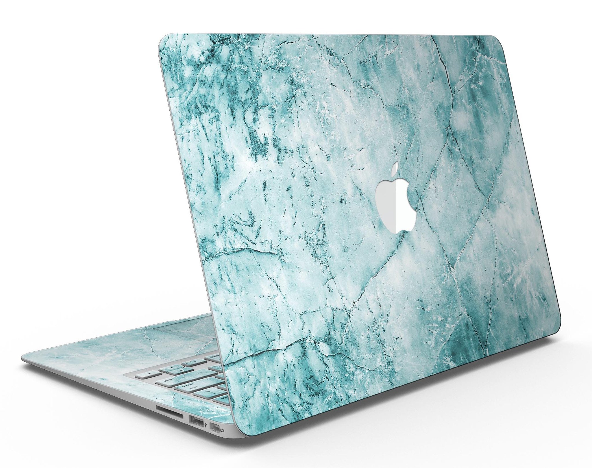 Cracked turquoise marble skin applied on a MacBook Air, showcasing its stylish design and sleek finish.