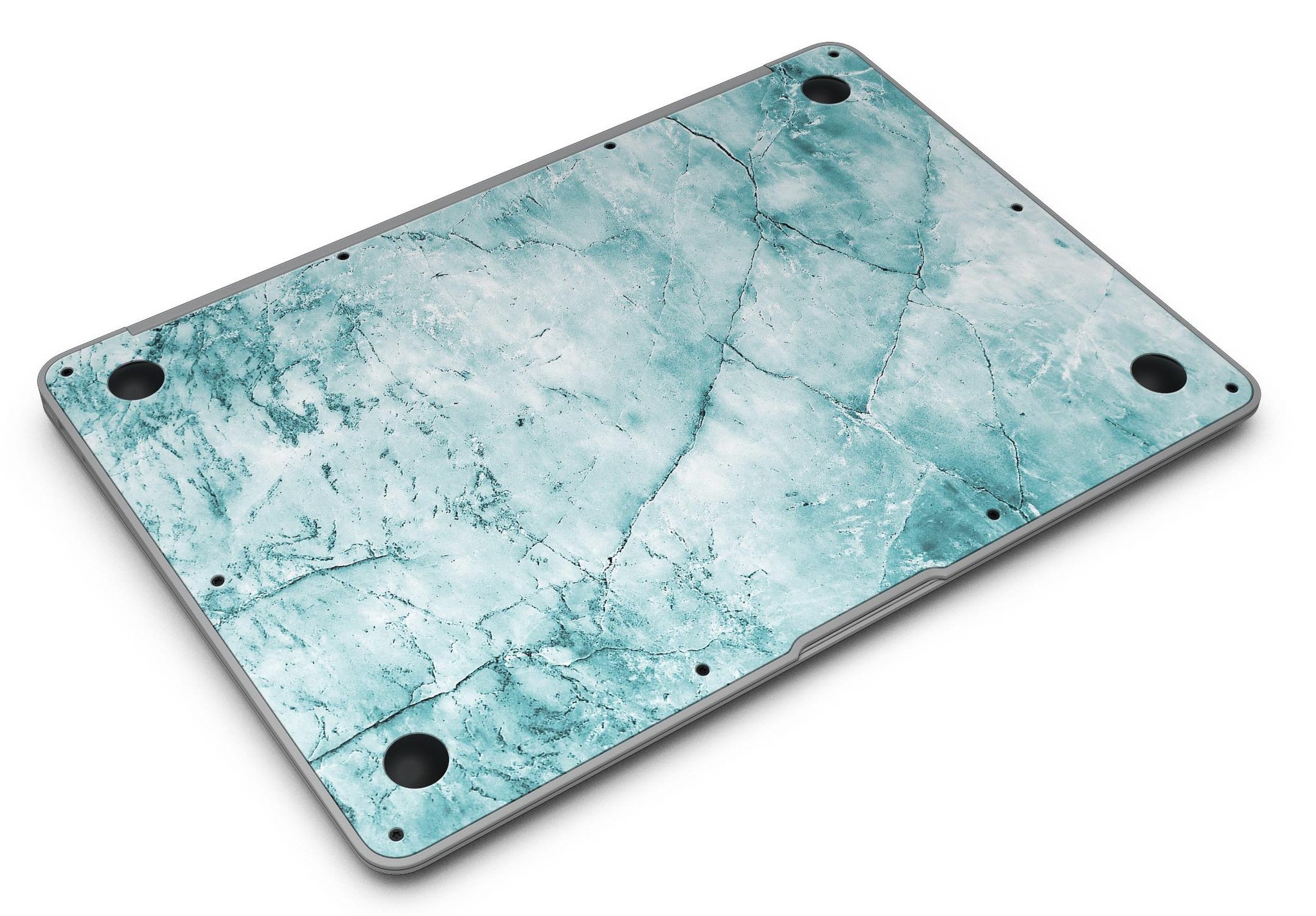 Cracked turquoise marble skin applied on a MacBook Air, showcasing its stylish design and sleek finish.