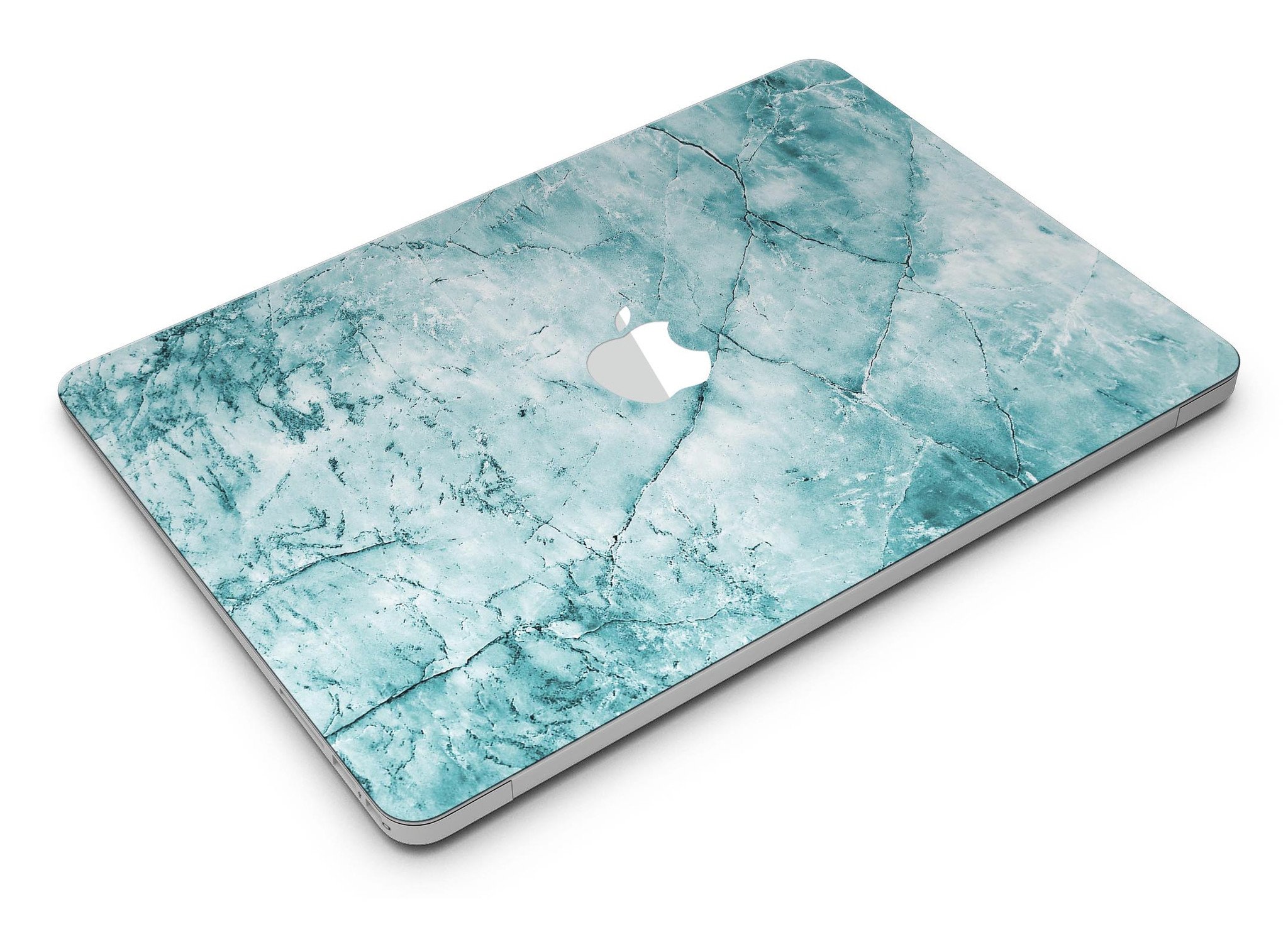 Cracked turquoise marble skin applied on a MacBook Air, showcasing its stylish design and sleek finish.