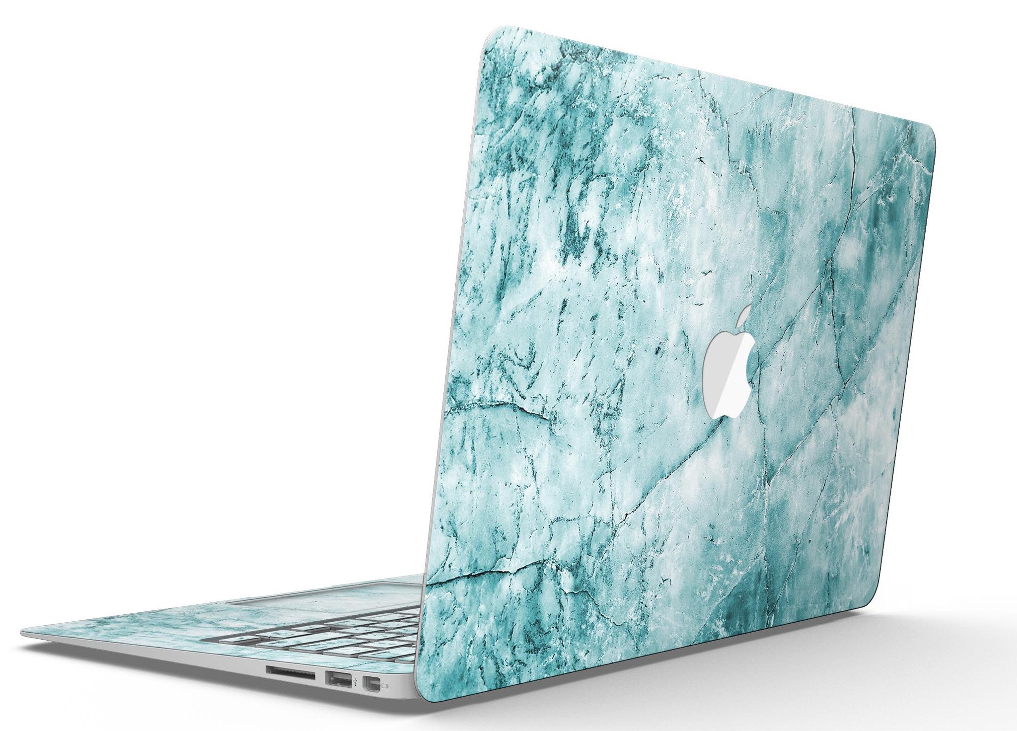 Cracked turquoise marble skin applied on a MacBook Air, showcasing its stylish design and sleek finish.