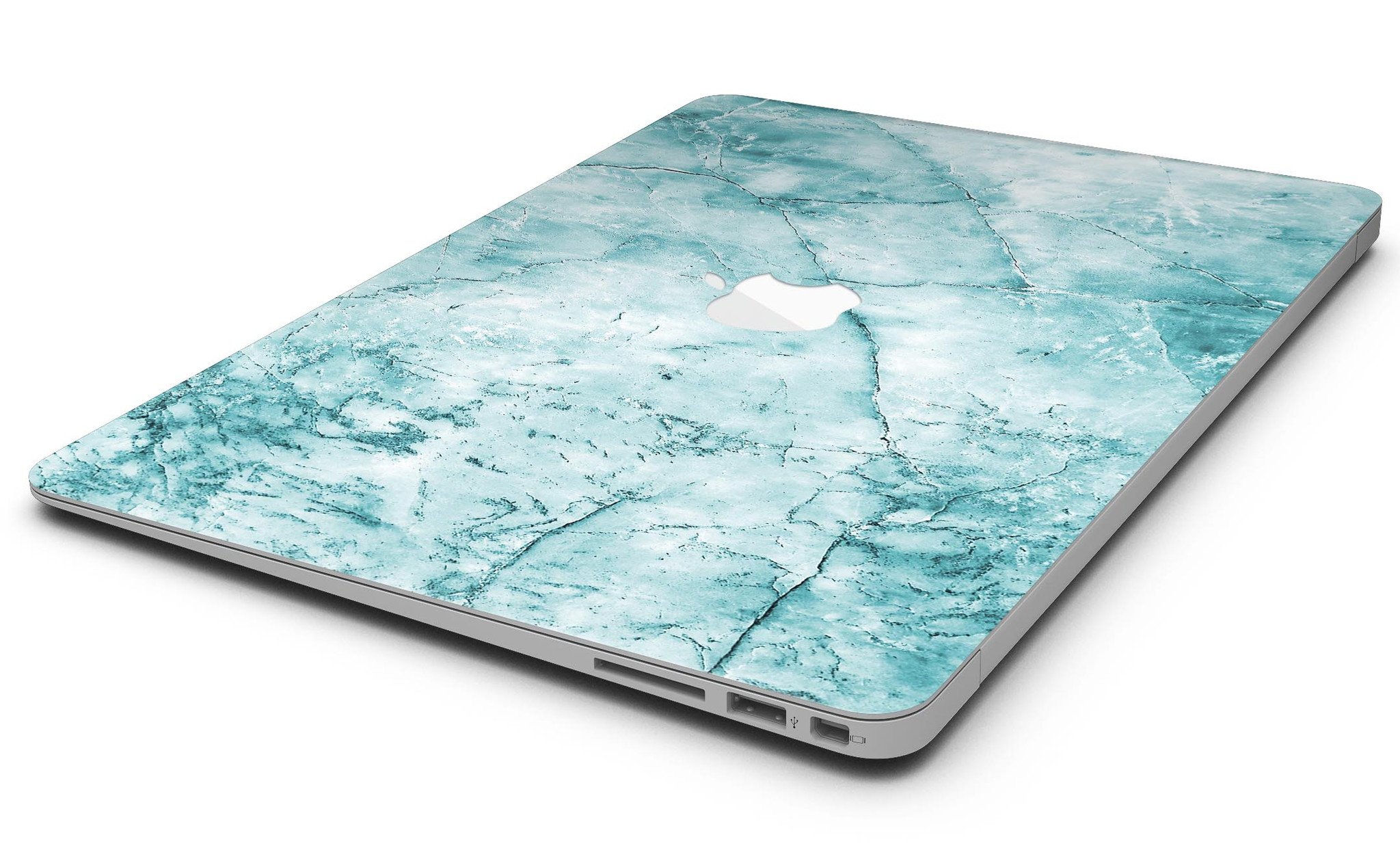 Cracked turquoise marble skin applied on a MacBook Air, showcasing its stylish design and sleek finish.