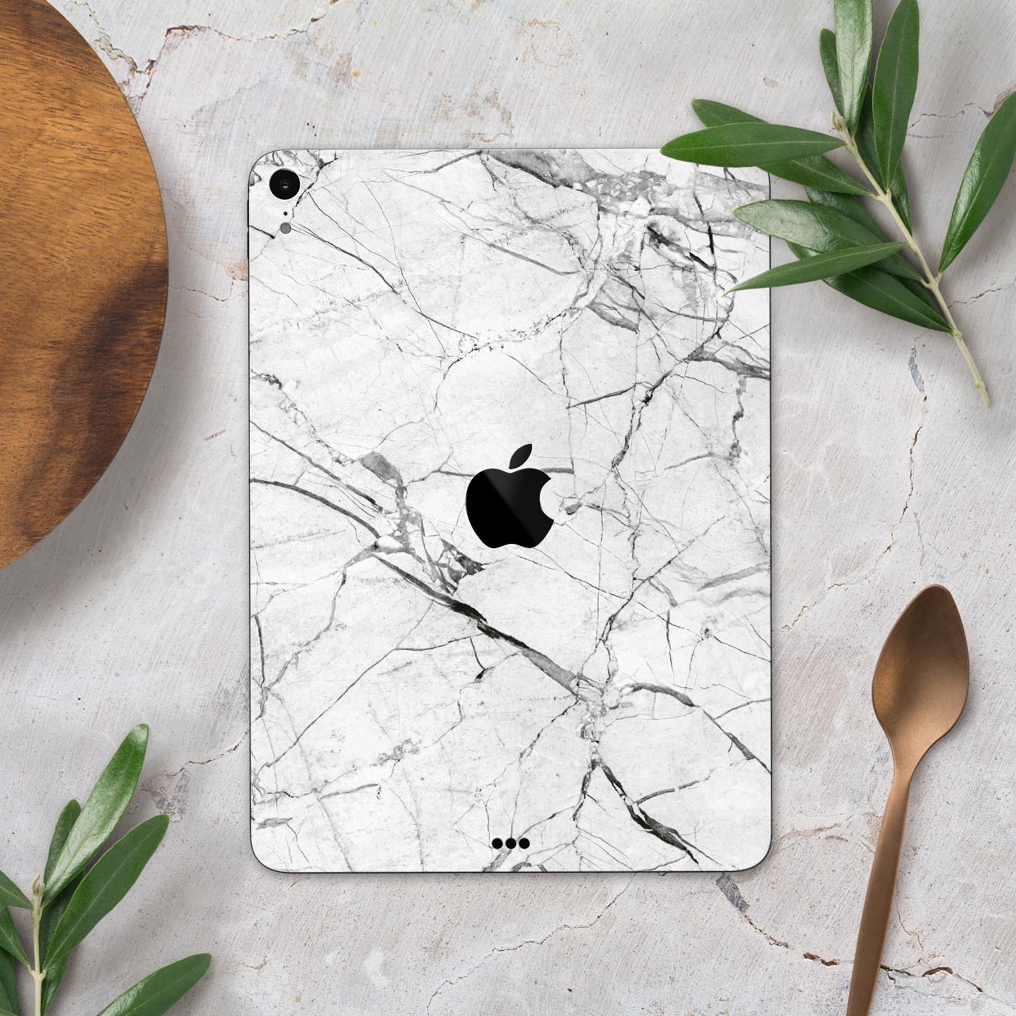 Cracked White Marble Slate skin decal for Apple iPad, showcasing a stylish marble design with a smooth finish.