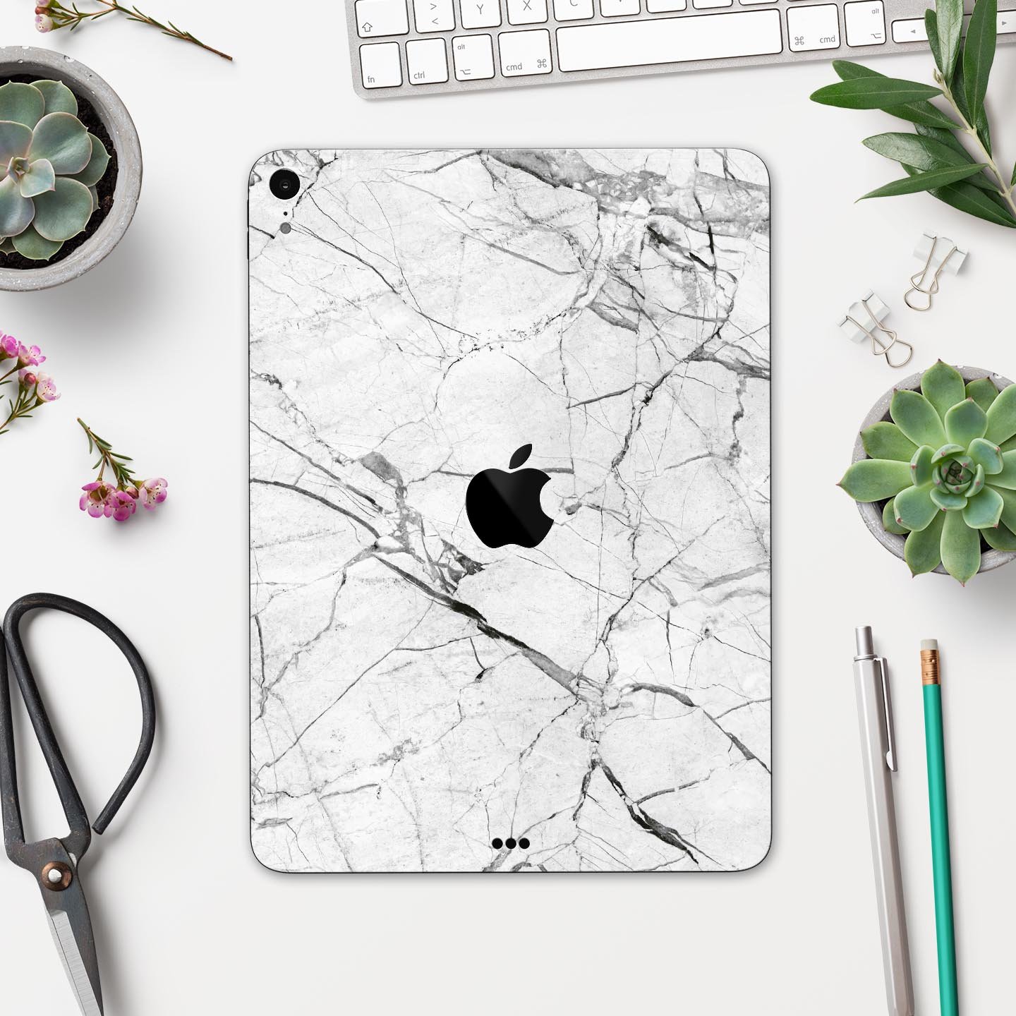 Cracked White Marble Slate skin decal for Apple iPad, showcasing a stylish marble design with a smooth finish.