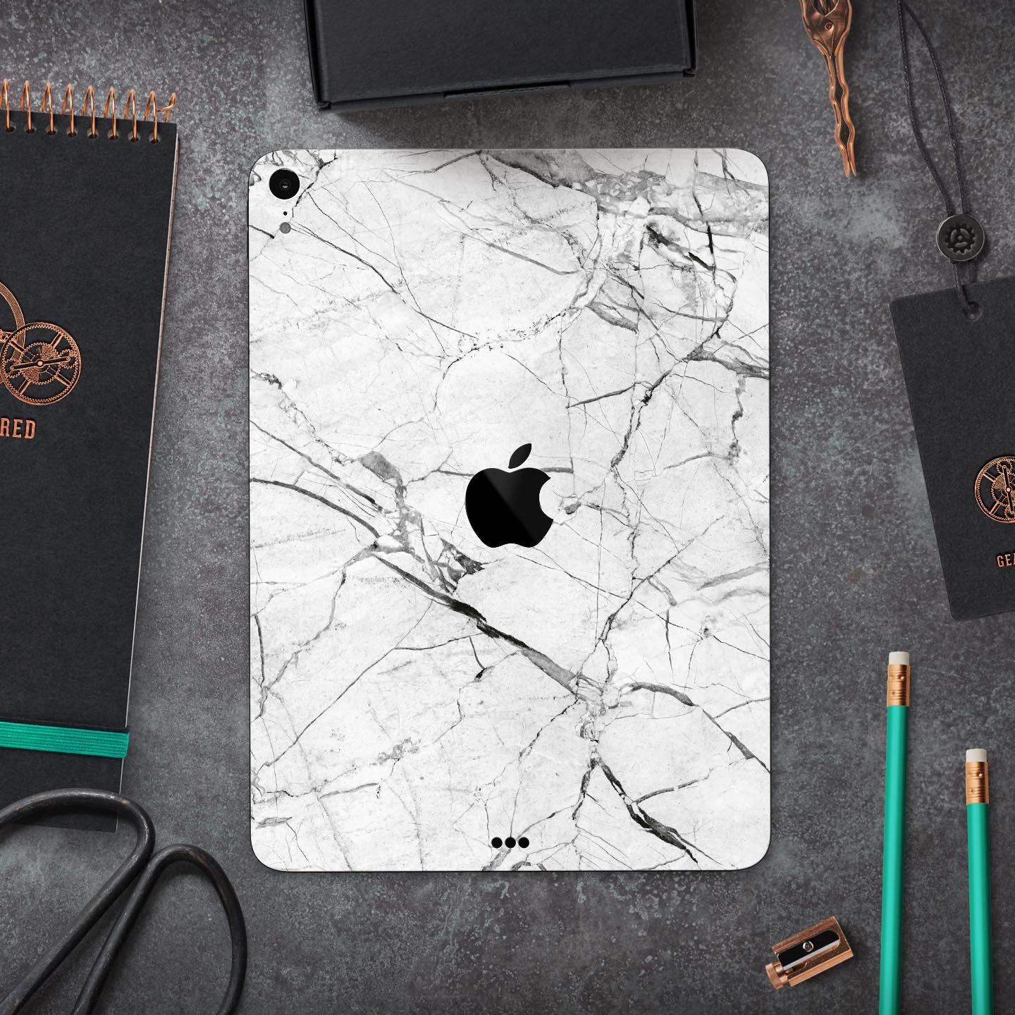 Cracked White Marble Slate skin decal for Apple iPad, showcasing a stylish marble design with a smooth finish.