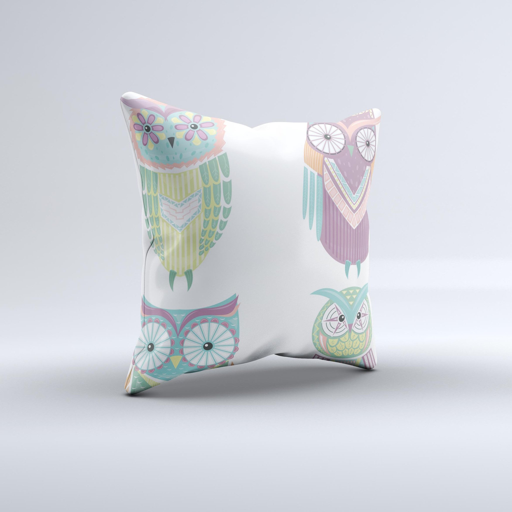 A colorful decorative throw pillow featuring whimsical cartoon owls, handcrafted in Virginia with high-quality materials.