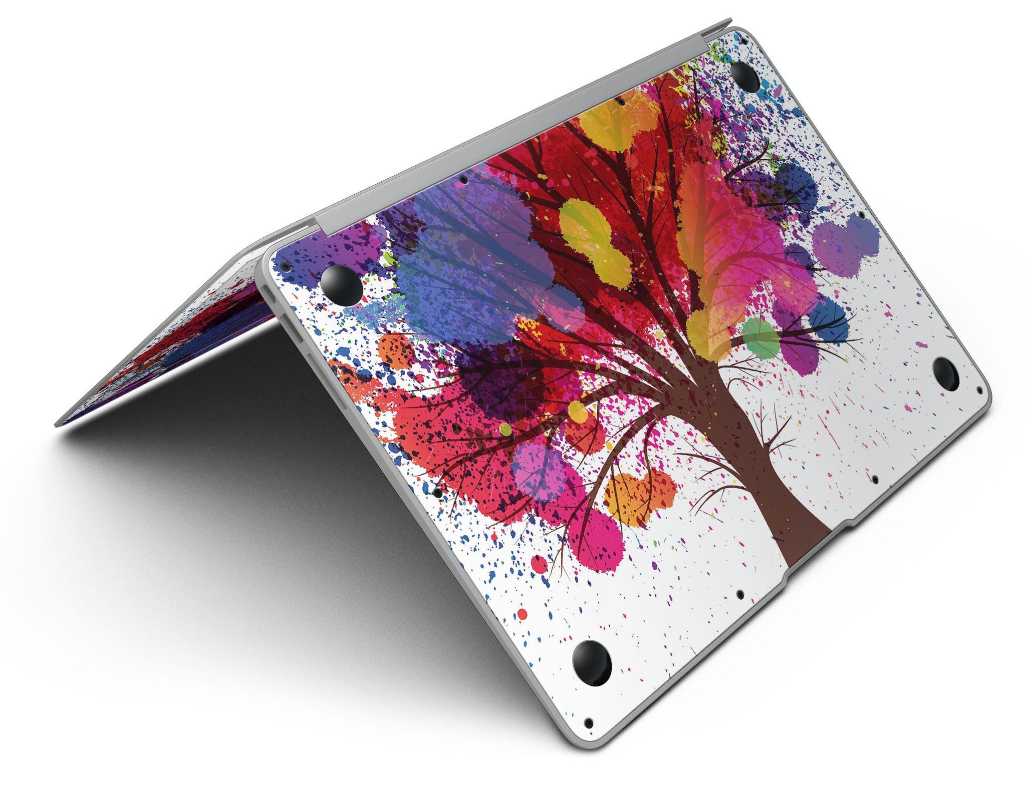 Crazy Splatter Tree MacBook Air Skin Kit showcasing vibrant splatter design on premium vinyl.