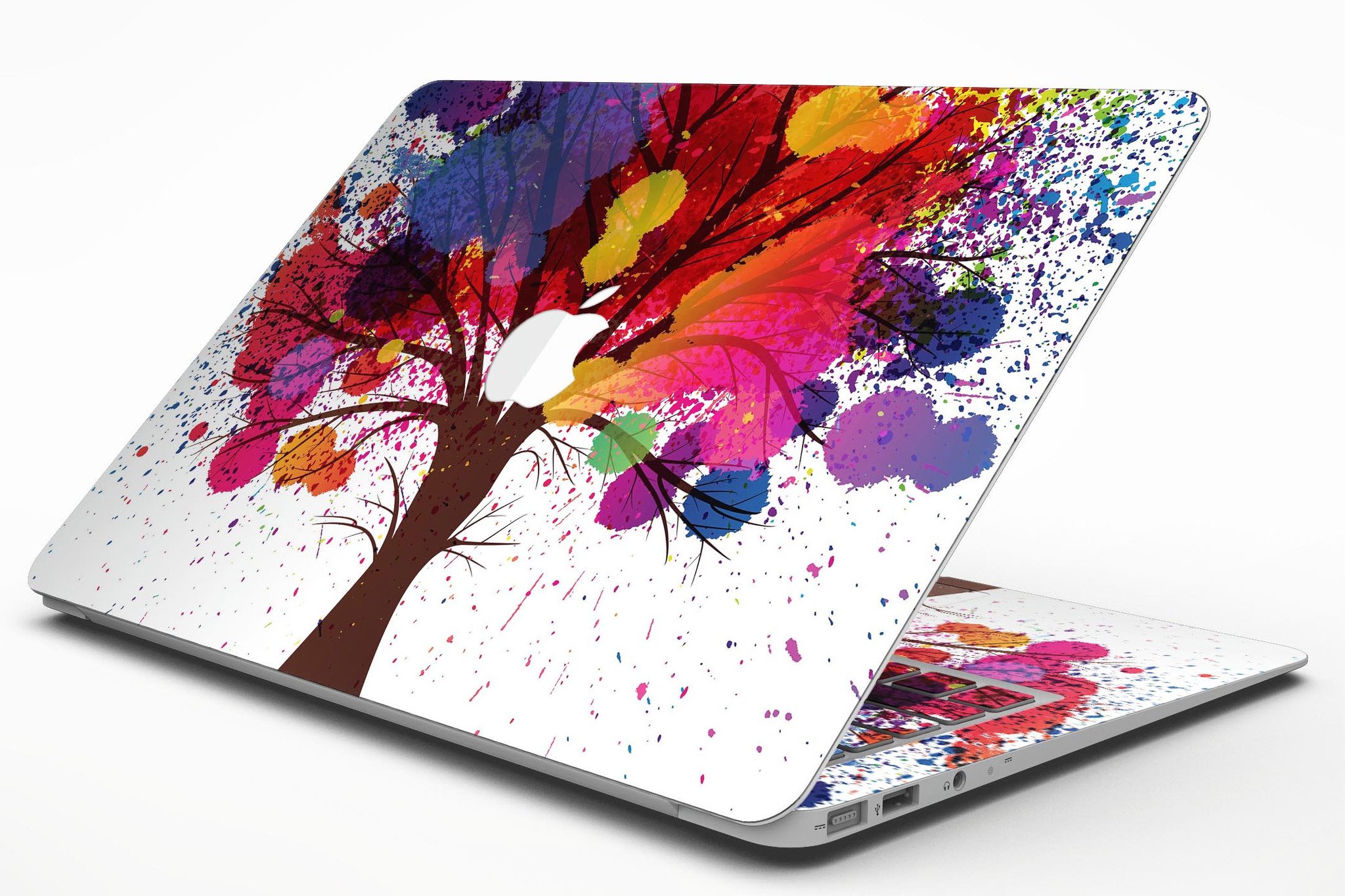 Crazy Splatter Tree MacBook Air Skin Kit showcasing vibrant splatter design on premium vinyl.