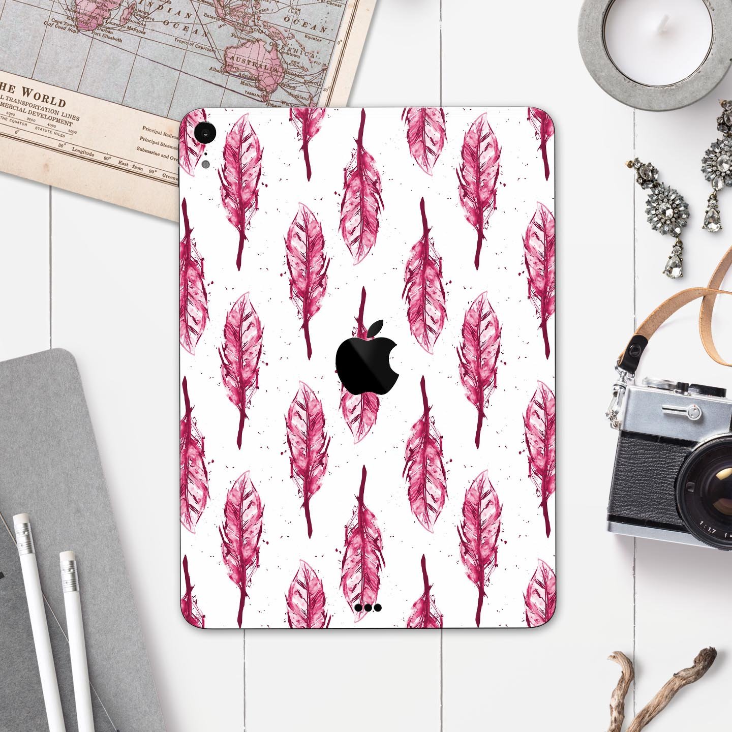 Crimson Feather Pattern skin decal for Apple iPad Pro, showcasing vibrant colors and intricate feather design.