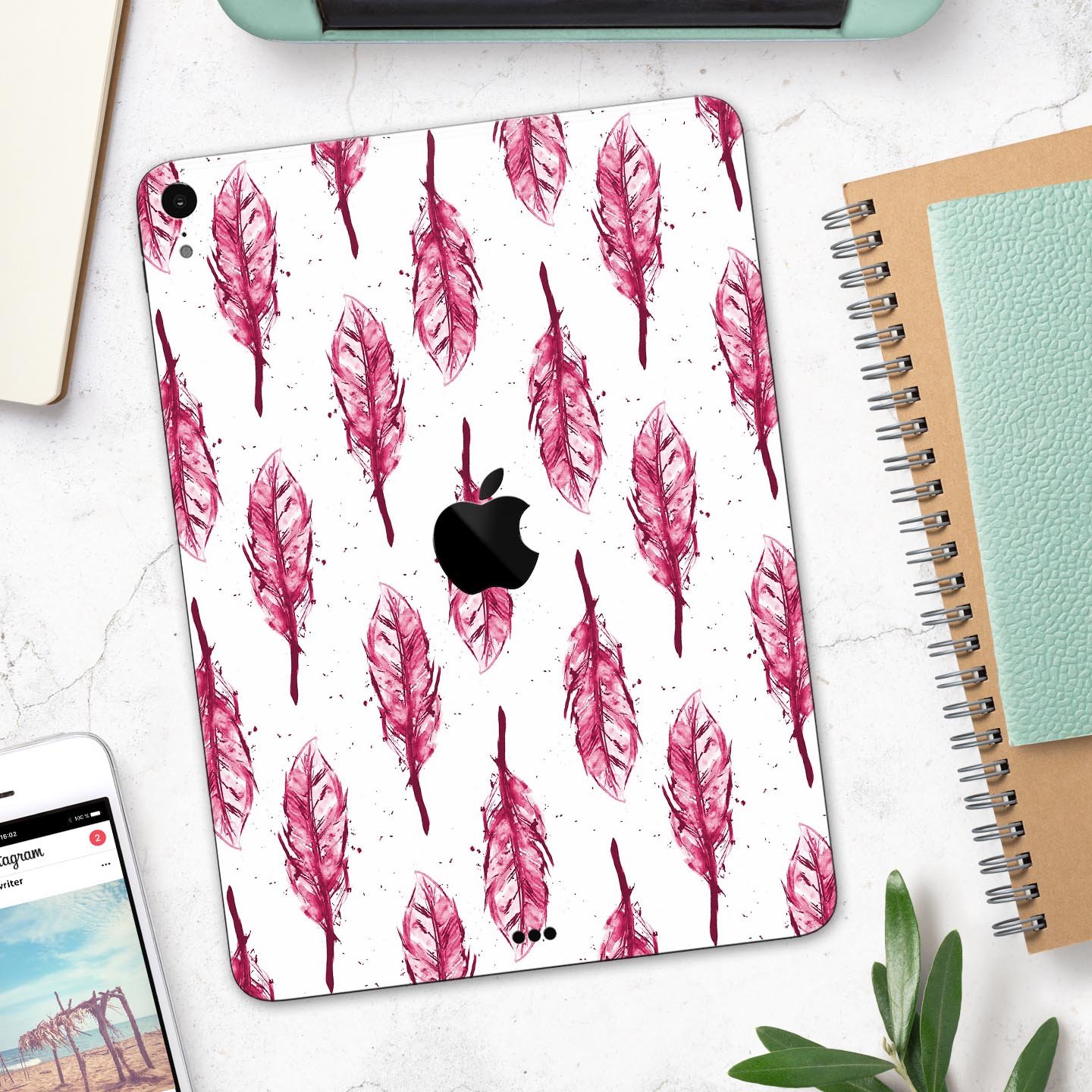 Crimson Feather Pattern skin decal for Apple iPad Pro, showcasing vibrant colors and intricate feather design.