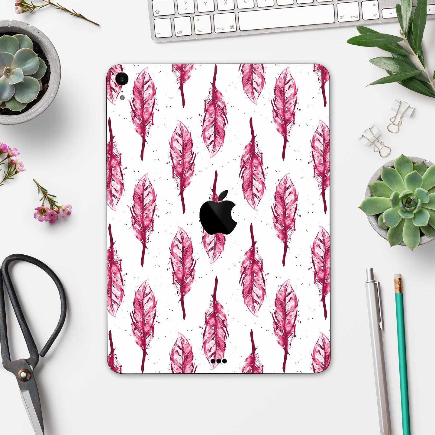 Crimson Feather Pattern skin decal for Apple iPad Pro, showcasing vibrant colors and intricate feather design.